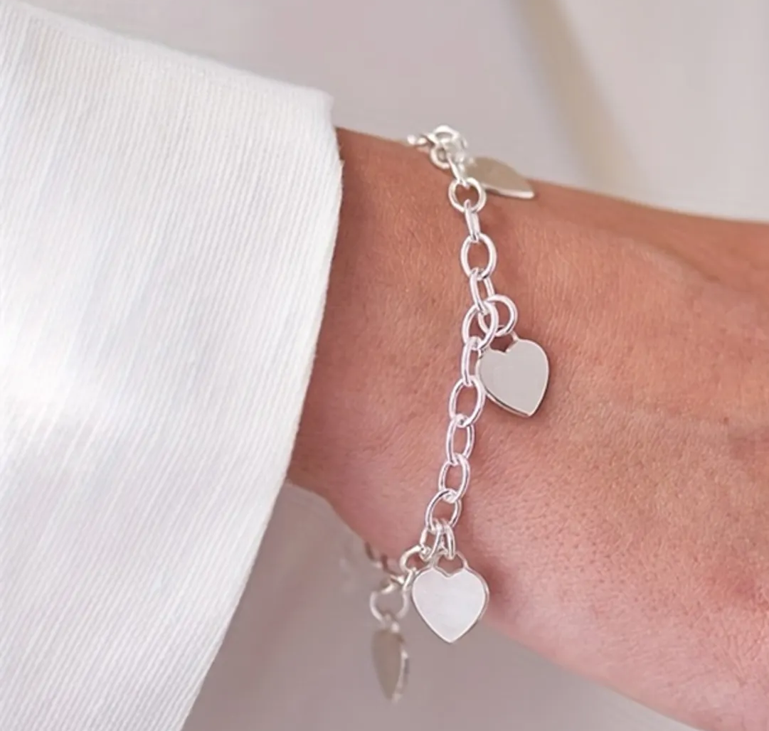 BRACCIALE 4 CUORI ACCIAIO