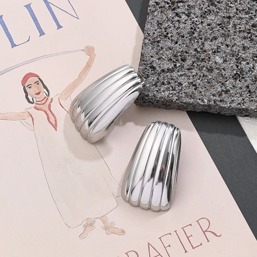 ORECCHINI GEOMETRICI IRREGOLARI ACCIAIO