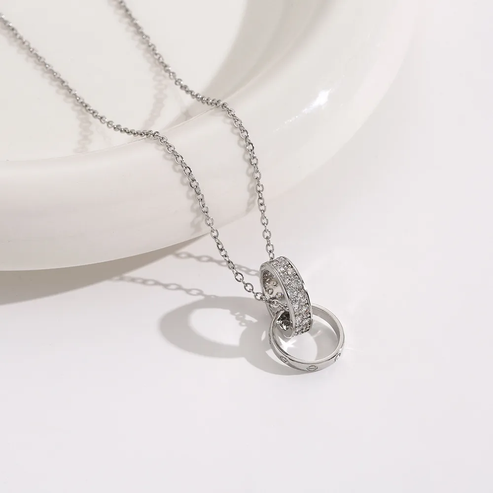 COLLANA ANELLI INTRECCIATI ACCIAIO