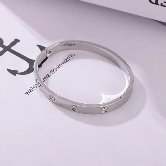 BRACCIALE RIGIDO PUNTI LUCE ACCIAIO