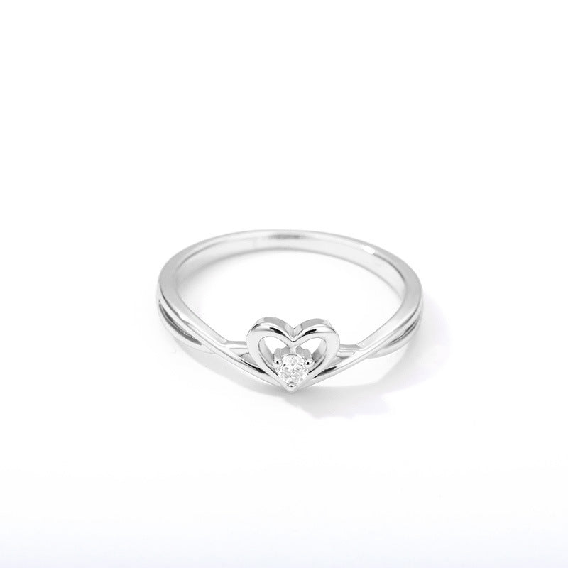 ANELLO CON CUORE E PUNTO LUCE ACCIAIO